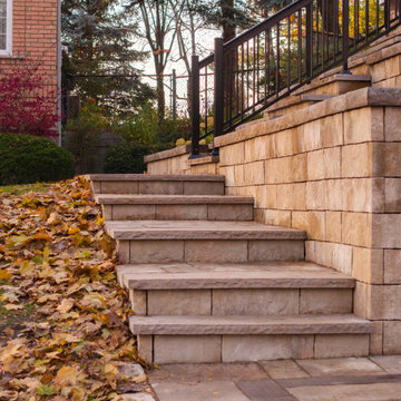 Custom Front Entrance Stonework & Retaining Wall Landscape Design