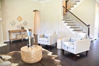 Example of a large country enclosed dark wood floor living room design in Dallas with a corner fireplace and a concrete fireplace
