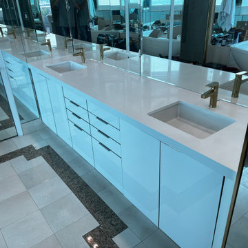 Modern Kitchen and Bathroom Remodel Done in a White Acrylic