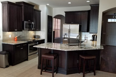 Design ideas for a transitional kitchen in Orlando.