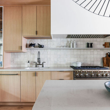 Cottage Kitchen with Rift White Oak & Metal Framed Cabinets