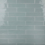 Merola Tile - Chester Acqua Ceramic Wall Tile - Offering a subway look, our Chester Acqua Ceramic Wall Tile features a smooth, glossy finish, providing decorative appeal that adapts to a variety of stylistic contexts. With its semi-vitreous features, this blue rectangle tile is an ideal selection for indoor commercial and residential installations, including kitchens, bathrooms, backsplashes, showers, hallways and fireplace facades. This tile is a perfect choice on its own or paired with other products in the Chester Collection. Tile is the better choice for your space!