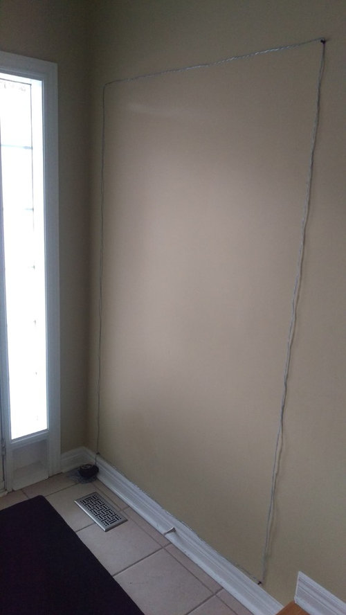 Wall behind front door advice