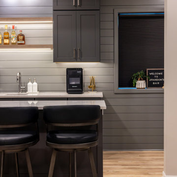 Shawnee, KS Basement Remodel with Custom Bar & Golf Simulator
