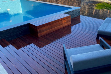 Design ideas for a beach style deck in Melbourne.