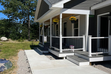 Inspiration for a mid-sized modern exterior home remodel in Portland Maine