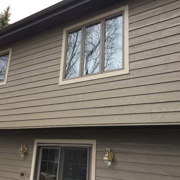 Diamond Kote siding, aluminum Dark bronze soffit and gutters