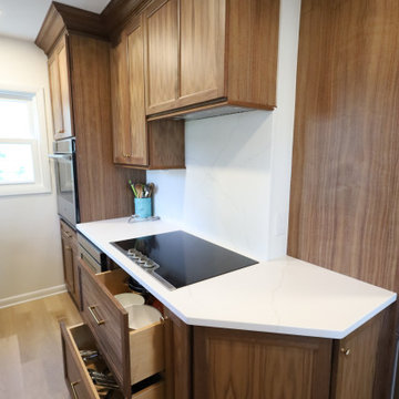 Rich & Refined: Custom Walnut Kitchen Remodel with White Quartz & Oak Flooring
