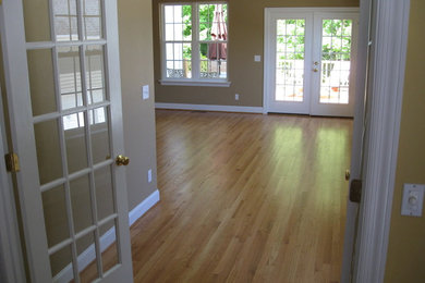 Example of a large trendy light wood floor sunroom design in Other with a standard ceiling