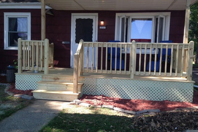 Front porch photo in Other with decking