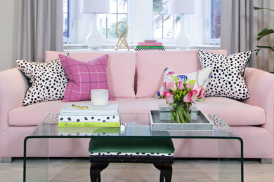 Transitional living room photo in Toronto with a stone fireplace