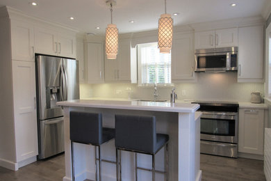 Example of a minimalist kitchen design in Toronto