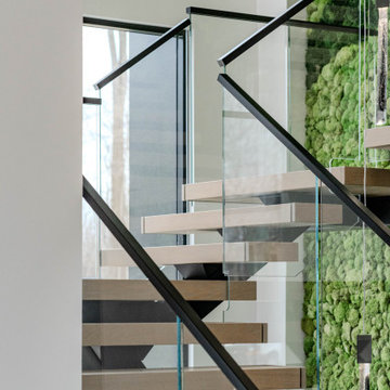 Electic Switchback Staircase with Glass Railing