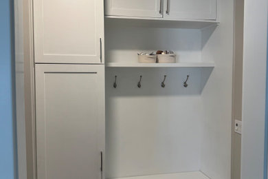 Inspiration for a mid-sized contemporary mudroom remodel in New York