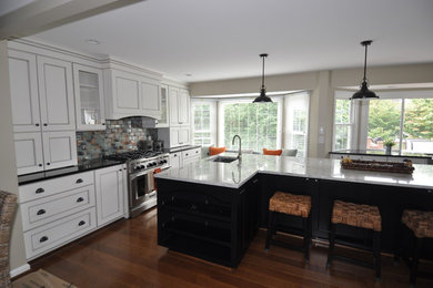 Inspiration for a large contemporary eat-in kitchen remodel in DC Metro with an undermount sink, stainless steel appliances and an island