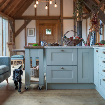 Country Style Sage Green Shaker Kitchen with Colonial White Granite Tops