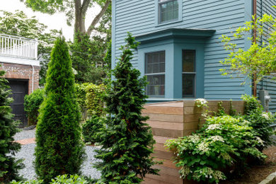 Example of a transitional home design design in Boston