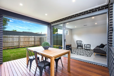 This is an example of a mid-sized modern patio in Melbourne.