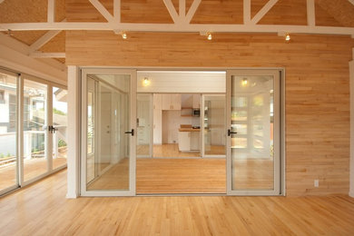 Example of a trendy home design design in Hawaii