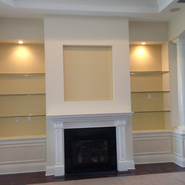 Built In Glass Shelves with Fireplace