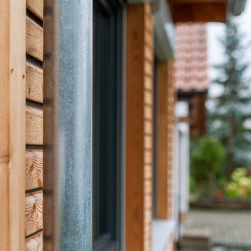 Holzanbau an ein Einfamilienhaus