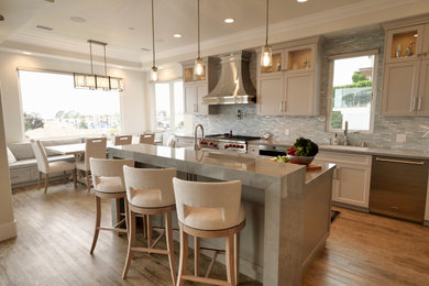 Example of a beach style home design design in Orange County