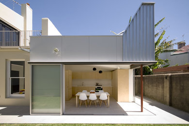 Photo of a small modern home design in Sydney.