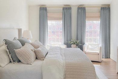 Example of a minimalist bedroom design in Richmond