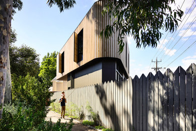 This is an example of a small contemporary two-storey house exterior in Los Angeles.