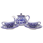 Bonechi Imports - Deruta Labor Ceramiche Arabesco Blue Teapot and 2 Tea Cups with Saucers - Enjoy tea for two with this hand painted Italian ceramic tea set. With a charming design of a spritely bird in the leaves and flowers, Arabesco is a widely popular ceramic pattern that comes from the town of Deruta in the Italian region of Umbria. This bird is featured on the teapot and on each saucer. These ceramic teapot and mugs were handcrafted and painted by the artists in Deruta, Italy.