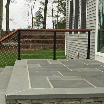 Black Aluminum Posts and Top Rail Support for Steps to Backyard in Rochester, MA
