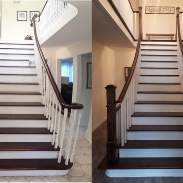 White painted risers, stringers and pickets with dark railings and stairs.