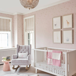 pink and gray nursery with dark furniture