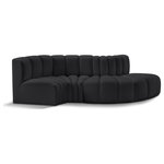 Meridian Furniture - Arc Vegan Leather Upholstered 4-Pc. S-Shaped Modular Sofa, Black - Unleash modern opulence with the Arc Vegan Leather 4pc. Sectional. Crafted for the modern connoisseur, this Sectional injects an air of refined luxury into any space. Its sleek silhouette, upholstered in supple black vegan leather, exudes timeless sophistication while the deep channel tufting adds textural intrigue, further elevating the chair's visual appeal. The modular design makes it a versatile chameleon, effortlessly adapting to your evolving needs and preferences. Whether you envision it gracing a chic living room corner, basking in the glow of a bedroom window, or adding a touch of drama to a home office, the Arc seamlessly complements your unique interior aesthetic.