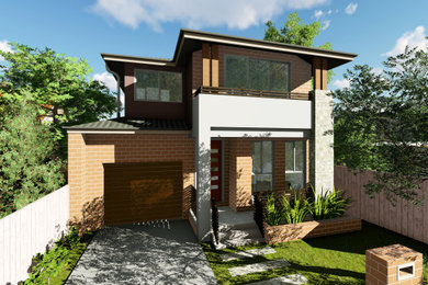 Photo of a mid-sized modern home design in Sydney.