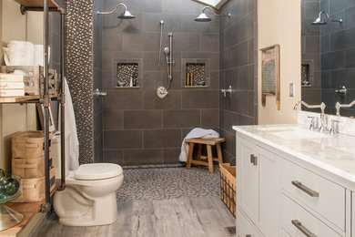 Example of a mid-sized urban master gray tile and porcelain tile porcelain tile and gray floor walk-in shower design in Seattle with gray cabinets, a two-piece toilet, beige walls, a drop-in sink, marble countertops and shaker cabinets