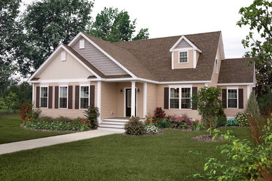 Inspiration for a mid-sized timeless beige one-story vinyl exterior home remodel in Philadelphia