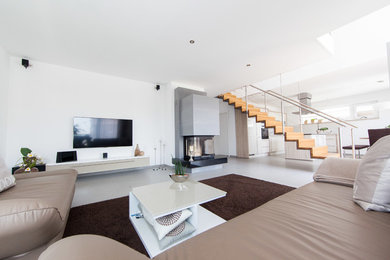 This is an example of a contemporary living room in Other.