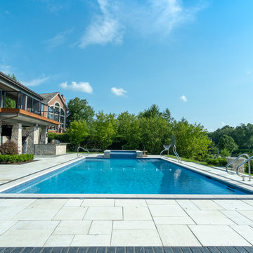 Burr Ridge Lap Pool with Raised Hot Tub and Waterfall
