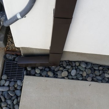 Costa Mesa, New Modern Home. Angle Face 5 inch Gutters, Smooth Downspouts.