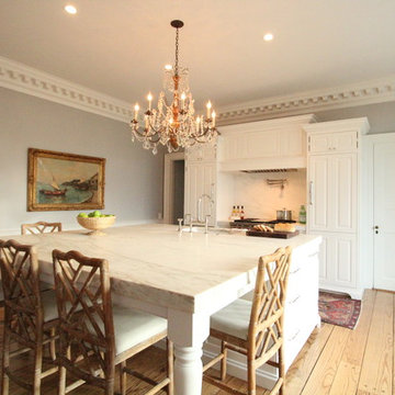 Traditional Kitchen with 8' square island with marble countertops