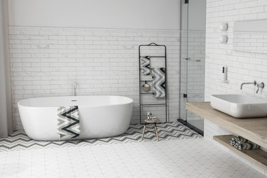 Example of a minimalist white tile and porcelain tile porcelain tile and white floor bathroom design in Orange County with white walls