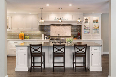 Example of a transitional kitchen design in New York