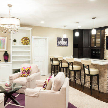Basement Family Room with Basement Sitting Area, Built-In Bookshelves, & Designe