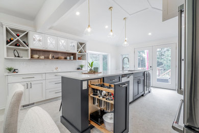 Large transitional galley ceramic tile, gray floor and exposed beam kitchen pantry photo in Toronto with a double-bowl sink, shaker cabinets, blue cabinets, quartz countertops, white backsplash, quartz backsplash, stainless steel appliances, an island and white countertops