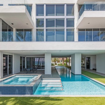 Custom Swimming Pool & Spa That Goes Underneath Part of the The House