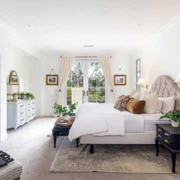 Traditional Bedroom with Tufted Headboard, French Doors, and Soft Neutral Decor