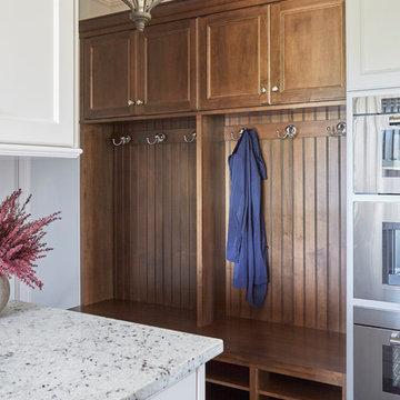 Mudroom with Coat Hooks, Bench Seating, and Open Show Shelves