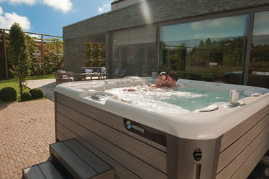Homes Featuring the Hot Spring Spa Highlife Envoy® NXT 5 Person Hot Tub