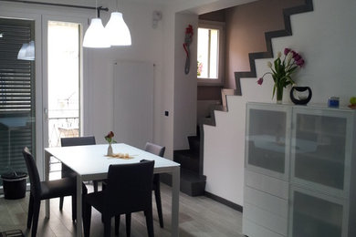 This is an example of a contemporary dining room in Catania-Palermo.